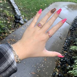 The ring on the right was custom. I was actually able to draw how I envisioned it (as you can see, to match the old one), and it is PERFECT. The ring on the right was custom. I was actually able to draw how I envisioned it (as you can see, to match the old one), and it is PERFECT.