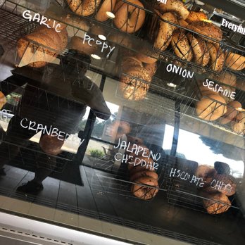 Boardwalk Bagels - Many bagel flavors to chose from (sorry for the reflection and bad pic) - Cafes Near Me - Cypress, California