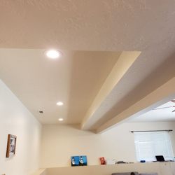 Atop All Electric - New can lights to light this area for reading. No drywall damage.