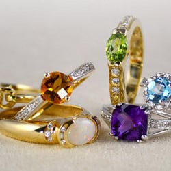 Elmwood Plaza Jewelers - 14 karat white or yellow gold pieces with genuine gemstones for every occasion!