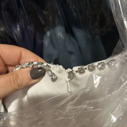 Seam was coming undone when I picked it up and jeweled were falling off. Seam was coming undone when I picked it up and jeweled were falling off.