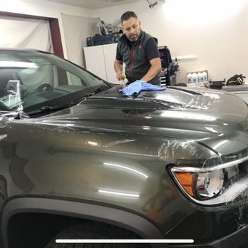 JG Installers - Juan getting ready to cover the hood. - Vehicle Wraps Near Me - San Rafael, California JG Installers - Juan getting ready to cover the hood. - Vehicle Wraps Near Me - San Rafael, California