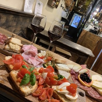 Cantina dei Papi - Oboard for 2 , and bruschetta and vino.. 3 types of meat 2 cheeses fruit , 3 pieces of bread with olive, truffle spread - Wine Bars Near Me - Rome, RM Cantina dei Papi - Oboard for 2 , and bruschetta and vino.. 3 types of meat 2 cheeses fruit , 3 pieces of bread with olive, truffle spread - Wine Bars Near Me - Rome, RM