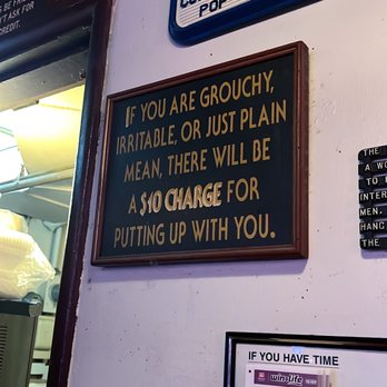 Happy Landing - a sign on the wall saying if you are grouchy, irritable or just plain mean there will be a - Bars Near Me - Portland, Oregon Happy Landing - a sign on the wall saying if you are grouchy, irritable or just plain mean there will be a - Bars Near Me - Portland, Oregon