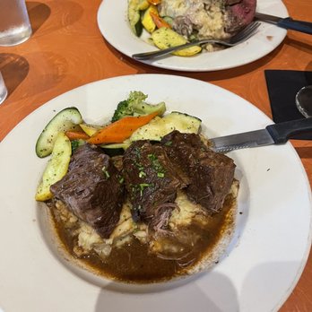 Food Studio - Braised Short Ribs in front, OMG Steak Dianne in back. Yum! - Cocktail Bars Near Me - Grants Pass, Oregon