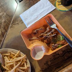 Sundowner Bar & Grill - Wings and chicken Philly.