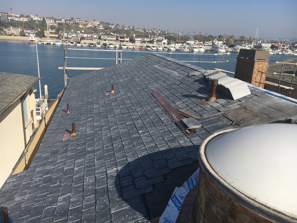 Slide of Lemus Roofing