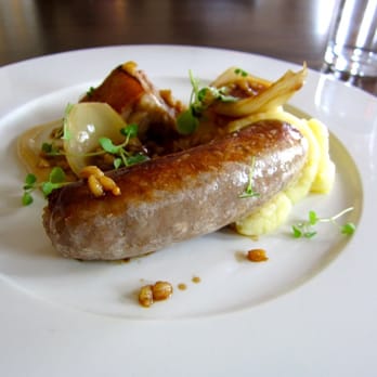 The Pig's Ear - Jane Russell's Original Pork Sausage with Spelt Pearls, Granny Smith Apple & Cider Onions - Bistros Near Me - Dublin, D The Pig's Ear - Jane Russell's Original Pork Sausage with Spelt Pearls, Granny Smith Apple & Cider Onions - Bistros Near Me - Dublin, D
