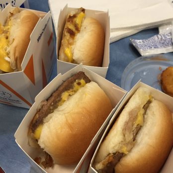 White Castle - three hot dogs in boxes on a table - Fast Food Near Me - Bellefontaine Neighbors, Missouri White Castle - three hot dogs in boxes on a table - Fast Food Near Me - Bellefontaine Neighbors, Missouri