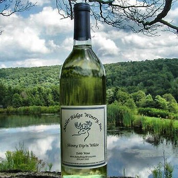 Antler Ridge Winery - a bottle of wine sitting on a rock - Wineries Near Me - Ulster, Pennsylvania