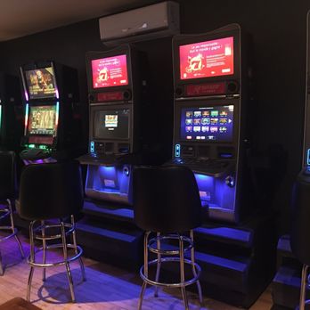 Bistro Manchester - a row of slot machines - Pubs Near Me - Chelsea, Quebec Bistro Manchester - a row of slot machines - Pubs Near Me - Chelsea, Quebec