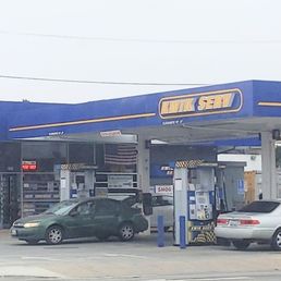 a car at a gas station a car at a gas station