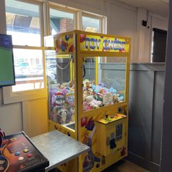 By Golly’s Bar & Grill  - Claw game, anyone?