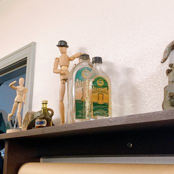 Liquor Stores - a shelf with various bottles and figurines - Beer, Wine & Spirits Near Me - Grants Pass, Oregon Liquor Stores - a shelf with various bottles and figurines - Beer, Wine & Spirits Near Me - Grants Pass, Oregon