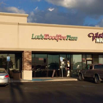 Lou's Wood Fire Pizza - Front of restaurant. In a small strip mall in front of Walmart - Pizza Near Me - Del Rio, Texas Lou's Wood Fire Pizza - Front of restaurant. In a small strip mall in front of Walmart - Pizza Near Me - Del Rio, Texas