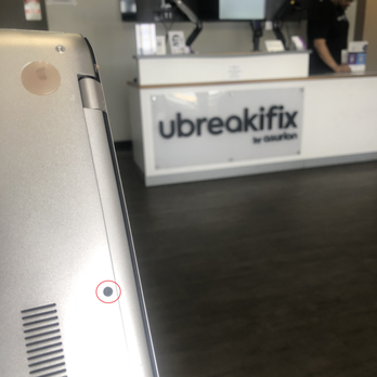 uBreakiFix - Photograph of the non-original black replacement screw - Electronics Repair Near Me - Phoenix, Arizona