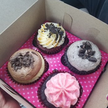 Smallcakes A Cupcakery - Red Velvet, cookies and cream, chocolate with strawberry frosting and vanilla with chocolate frosting. - Bakeries Near Me - Albuquerque, New Mexico Smallcakes A Cupcakery - Red Velvet, cookies and cream, chocolate with strawberry frosting and vanilla with chocolate frosting. - Bakeries Near Me - Albuquerque, New Mexico
