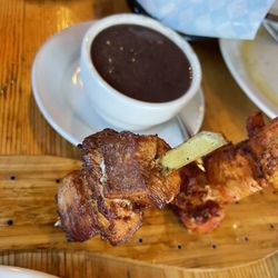 Dos Alas CubaRican Café & Lounge - Pork and chicken skewers. Black bean side delicious- a little dry