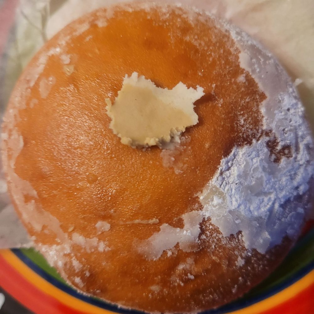 Visit Sicily - Bomboloni with pistachio cream. - Sicilian Near Me - New York, New York Visit Sicily - Bomboloni with pistachio cream. - Sicilian Near Me - New York, New York