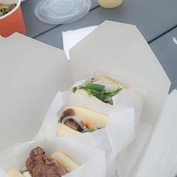 Bao and Broth - Kfc bao bottom left, and two pork belly bao! Lychee tea in the background, so yummy! - Ramen Near Me - Charlotte, North Carolina Bao and Broth - Kfc bao bottom left, and two pork belly bao! Lychee tea in the background, so yummy! - Ramen Near Me - Charlotte, North Carolina