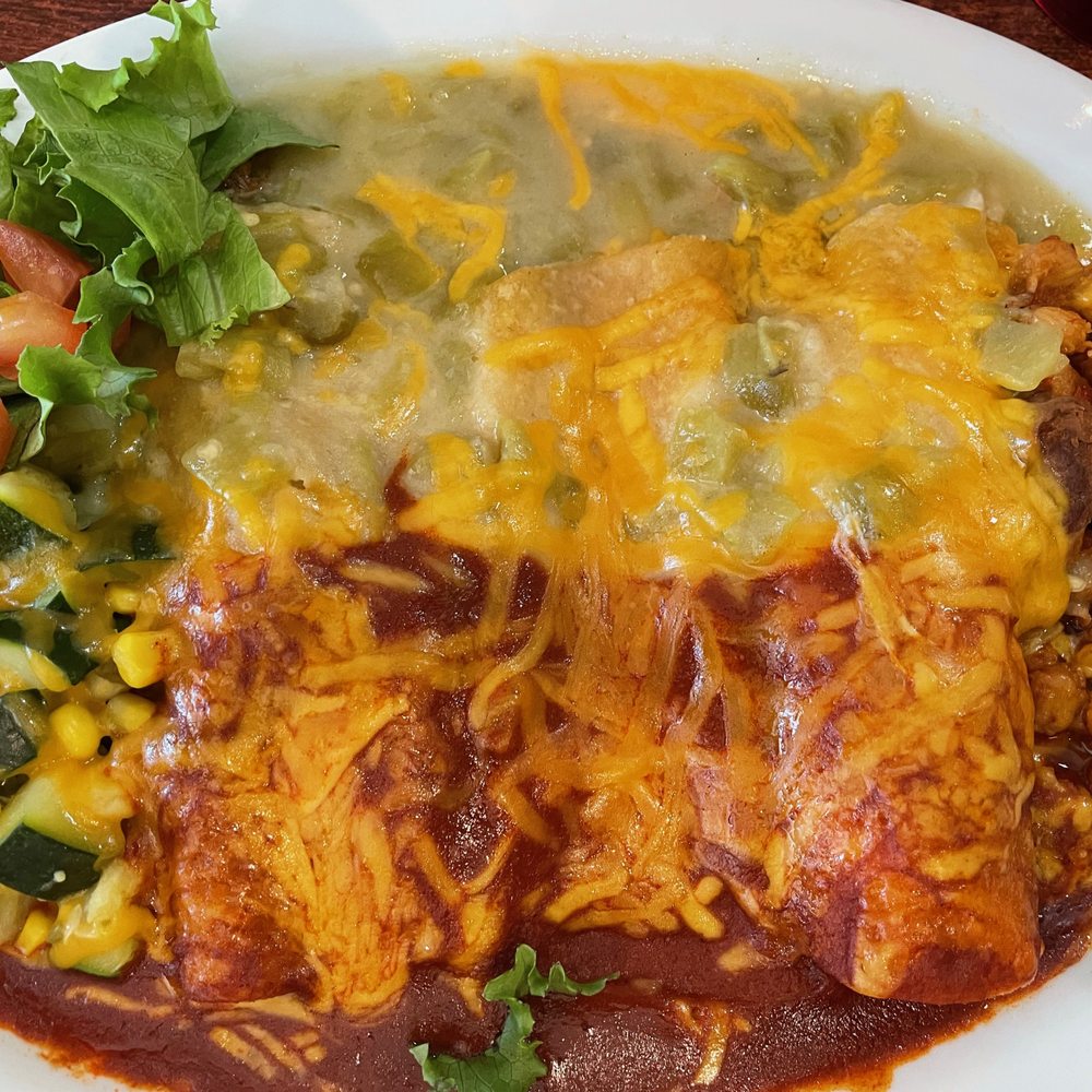 Enchilada Trio/Chrismas (red and green chile) with posole and Calabacitas. Enchilada Trio/Chrismas (red and green chile) with posole and Calabacitas.