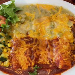 Enchilada Trio/Chrismas (red and green chile) with posole and Calabacitas.