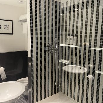The Hadsten Solvang, Tapestry Collection by Hilton - The shower in the bathroom - Hotels Near Me - Solvang, California The Hadsten Solvang, Tapestry Collection by Hilton - The shower in the bathroom - Hotels Near Me - Solvang, California