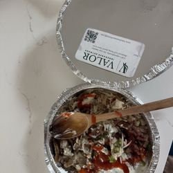 Business card as big as the bowl, small spoon is bigger than. The bowl