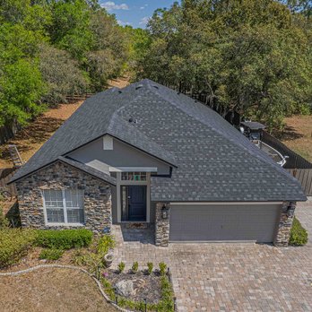 Stanley's Roofing - Aerial view of a recently completed shingle roof installation by Stanley's Roofing in Sorrento, FL... - Roofing Near Me - Sorrento, Florida Stanley's Roofing - Aerial view of a recently completed shingle roof installation by Stanley's Roofing in Sorrento, FL... - Roofing Near Me - Sorrento, Florida