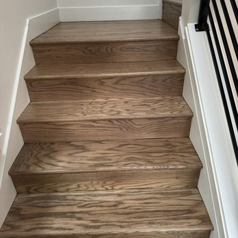 Dallas Watson Flooring - Also needed to refinish the stairs to the new color.  They covered installation nails that showed with the lighter color perfectly. - Flooring Near Me - Seattle, Washington