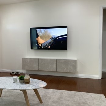 Install Pros - TV and floating cabinet mount with concealed cables - TV Mounting Near Me