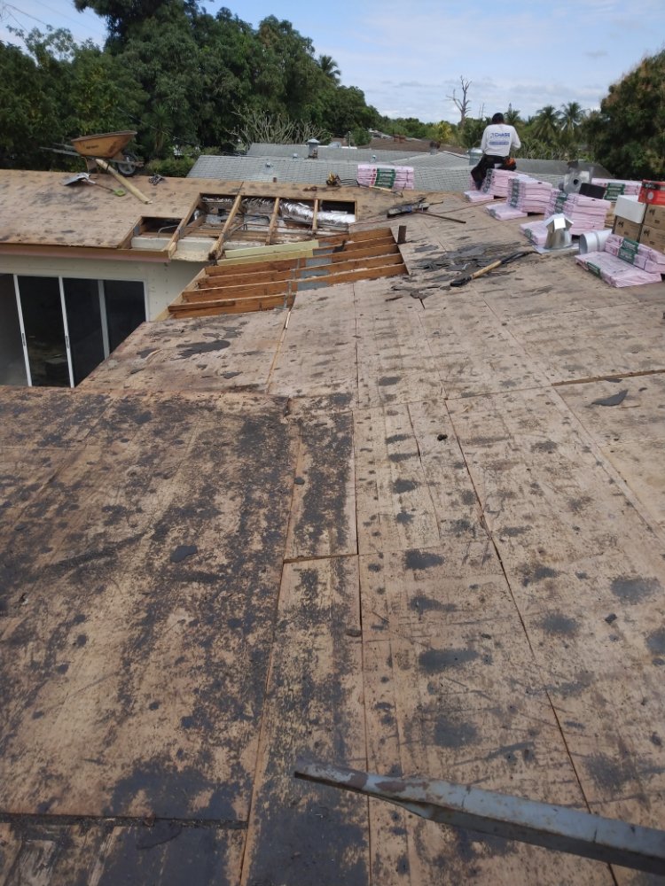 Slide of Carlos Roofing