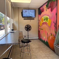 Live Wright Juice Bar - Strange looking mismatched furniture on the left.
