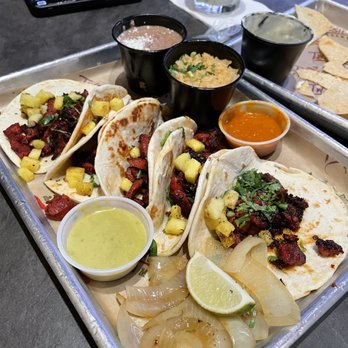 Twisted Trompo - Tacos pastor with grilled pineapple. - Mexican Near Me - Dallas, Texas Twisted Trompo - Tacos pastor with grilled pineapple. - Mexican Near Me - Dallas, Texas