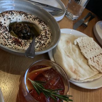Zhug - Hummus, #22 cocktail , house made pita - Mediterranean Near Me - Cleveland Heights, Ohio Zhug - Hummus, #22 cocktail , house made pita - Mediterranean Near Me - Cleveland Heights, Ohio