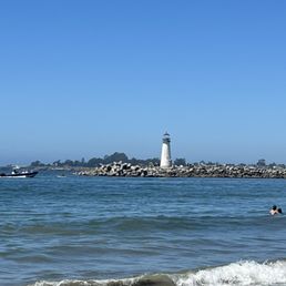 Lighthouse next to beach Lighthouse next to beach
