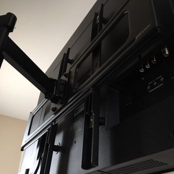 TV Guys - Universally mounted provided by the installers - Home Theatre Installation Near Me