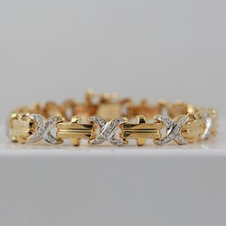 Golden Impulse - 14 karat yellow gold tennis bracelet with five Diamond links.