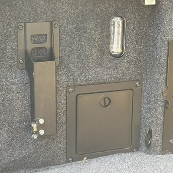 AutoNation Ford Littleton - Storage Bin...correctly done.  Correct hole and tucked in behind bin frame. - Car Dealers Near Me - Littleton, Colorado