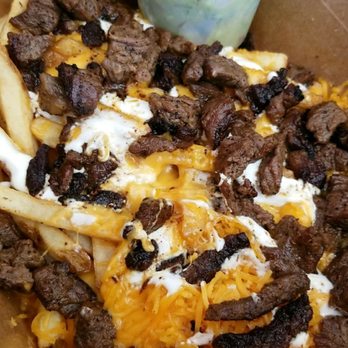 Brick and Flour - Carne asada fries. My friend ordered these and took off the cilantro and I think the salsa - Mexican Near Me - Glendale, California Brick and Flour - Carne asada fries. My friend ordered these and took off the cilantro and I think the salsa - Mexican Near Me - Glendale, California