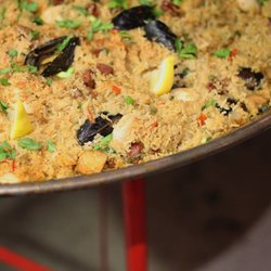Crystal Lake Catering Company - Surprise your guests with something interactive: we make "Jim-balaya," named after our founder, Jim Barnes.