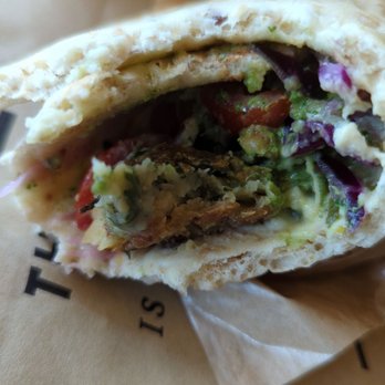 CAVA - Falafel, partially eaten, quite good. - Salad Near Me - Baltimore, Maryland CAVA - Falafel, partially eaten, quite good. - Salad Near Me - Baltimore, Maryland