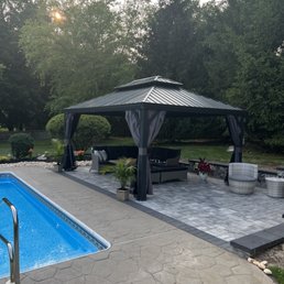 Brings the family together...thanks Alex for great job!  (next year we do around the pool)