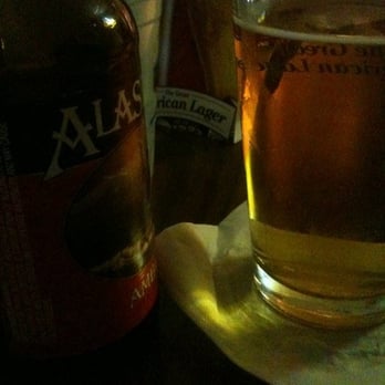 Polar Bar - a glass of beer and a bottle of beer - Dive Bars Near Me - Anchorage, Alaska