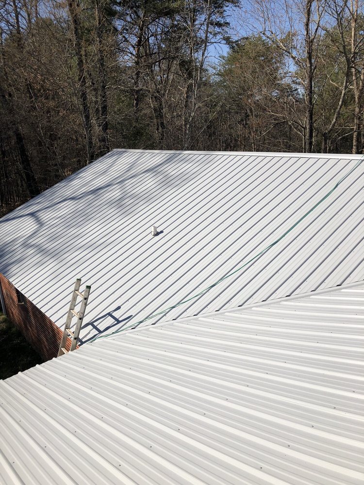 Slide of Sutton Roofing & Construction Company