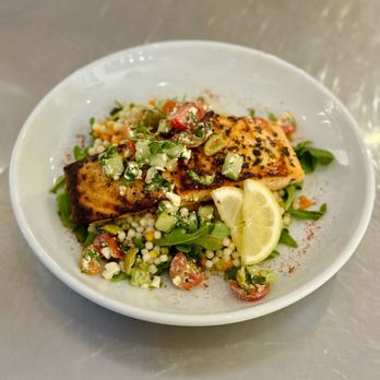 Olaf’s Restaurant - Weekly Special. Mediterranean Salmon on cous cous. - New American Near Me - Clifton, Texas