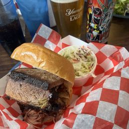 Brisket and pulled pork sandwich with coleslaw Brisket and pulled pork sandwich with coleslaw