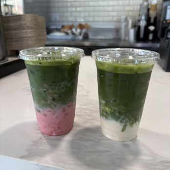 Ryokucha Cafe - Strawberry matcha latte (LEFT) Regular Matcha Latte (RIGHT) - Ice Cream & Frozen Yogurt Near Me - Palo Alto, California Ryokucha Cafe - Strawberry matcha latte (LEFT) Regular Matcha Latte (RIGHT) - Ice Cream & Frozen Yogurt Near Me - Palo Alto, California