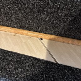 Random cut of carpet covering damage to the floor Random cut of carpet covering damage to the floor