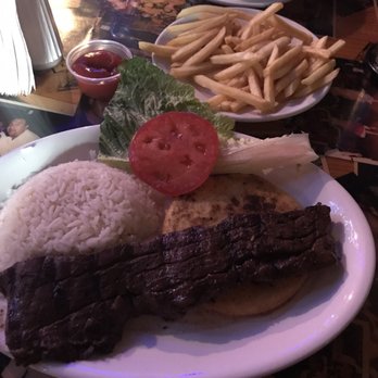 Pueblito Viejo - Carne asada with arepa, tomato, white rice and the choice of either house potatoes or French fries. - Colombian Near Me - Miami, Florida Pueblito Viejo - Carne asada with arepa, tomato, white rice and the choice of either house potatoes or French fries. - Colombian Near Me - Miami, Florida